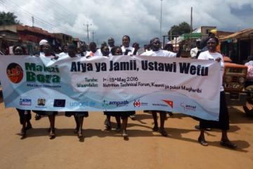 Health workers and members of the community commemorate AVW & Malezi Bora celebrations in West Pokot County, Kenya, recently