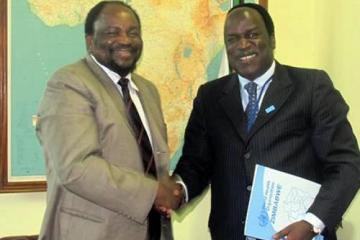 WR Zimbabwe, Dr David Okello and the Honorable Minister of Foreign Affairs Mr Simbarashe Mumbengegwi shaking hands at the accreditation ceremony