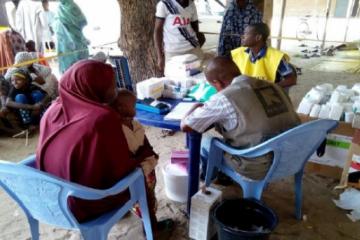 IRC Health officer been assisted by a community volunteer at Goni Kachallari community where Integrated PHC services are provided IRC