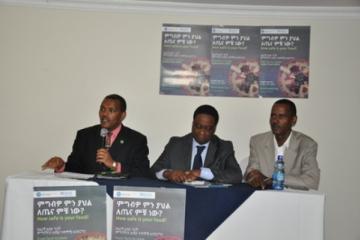 Dr Kebede Worku, Dr Pierre M'pele and Mr Waltaji Terfa moderating the discussion during the World Health Day Commemoration, 7 April 2015.