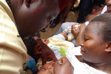 HE Governor Rochas Okorocha of Imo State vaccinating a child
