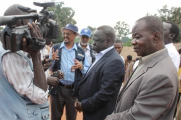Dr Abdi, Dr Riek Gai Kok and State Minster of Health addressing a team of journalists at the Gangura border entry point, Western Equatoria State.