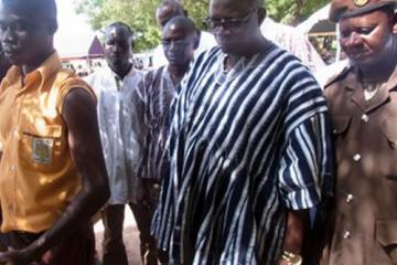 The Honourable Regional Minister, Alhaji Amin Sulemana, middle, witnesses the first shot