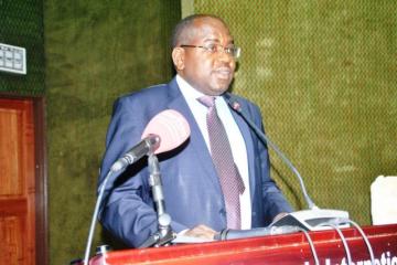 Hon. Minister of Health, Dr. Chitalu Chilufya, delivering his key note address at the high level stakeholders meeting on NCDS and development in Zambia