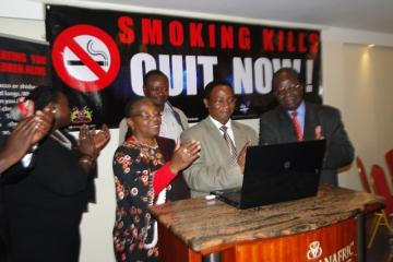 Dr Mandlhate WR Kenya accompanied by Dr Jackson Kioko, MOH, Dr Peter Peter Odhiambo (Tobacco Control Board and Mr Joel Gitali (behind them) , chairperson Kenya Tobacco Control Alliance as they launched the mass-media campaign in Nairobi.