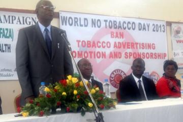 (L-R) The Hon. Minister of Health, Dr. Joseph Kasonde giving a statement to mark the WNTD at Nakatindi Hall in Lusaka, the WHO Representative, Dr. Olusegun Babaniyi , Dean, University of Zambia School of Medicine, Dr. Fastone Goma, and Mrs Brenda Chitindi, from the Tobacco Free Association of Zambia