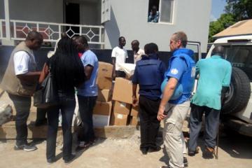 WHO staff delivering supplies to Juba Teaching Hospital in response to the conflict in Juba