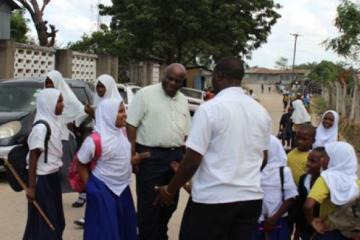 WHO Representative, Dr. Rufaro Chatora, interacting with the school children from affected communities to gauge awareness on cholera prevention measures.