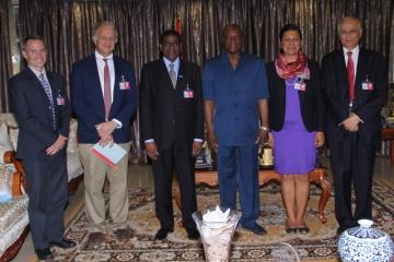 The President of Guinea (third from right) with the WHO Country Representative and experts from CDC and WHO
