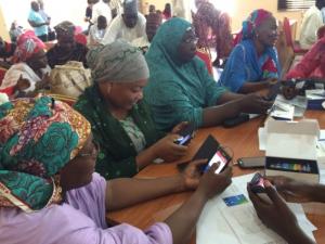 Health workers practicing real time reporting during EWARS in Borno