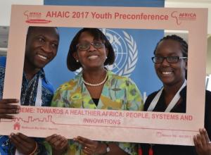 Dr Moeti in a selfie with young people after the town hall engagement at the AHAIC conference