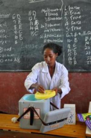 Health worker getting ready to vaccinate children in a school in Sabata town, Oromia region.