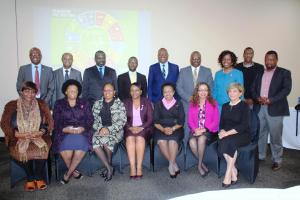 The consultants from AFRO posing for a group photo with the WHO Representative Dr Tigest Ketsela Mengestu, UNFPA Representative Ms Sharareh Armikhalili, Ministry of Health PS Dr Simon Zwane and other senior officers from the WCO and Ministry of Health during the high level meeting.
