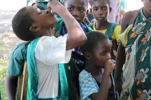 School children receive the oral cholera vaccine in Karonga.