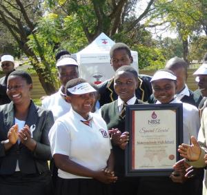 Students from the winning school pose with their award