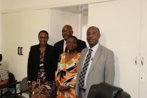 Dr Gasasira with Mrs Gore Staff Association President, MR Avognon, OO and Dr Nabyonga former OIC