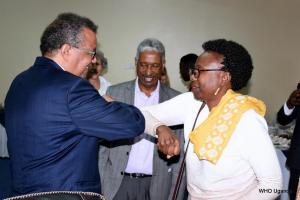 WHO Director General Dr Tedros (left) received by the Minister of Health Dr Dr Aceng (right) as WHO Uganda Country Representative- Dr Yonas Tegegn Woldemariam looks on