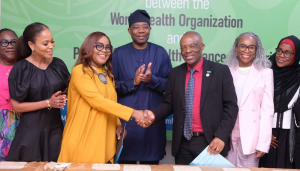 Figure 1 Handshake after signing of MoU to adopt a PHC to improve  health indcies in Nigeria.jpg