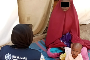 Fatima during a follow-up visit by WHO hard-to-reach medical team.png