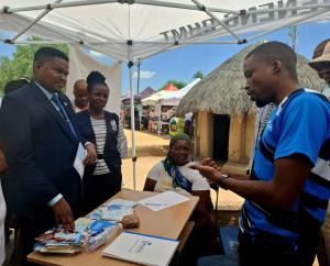 Looking on Minister of Sport & Arts, Jacob Kelebeng and WHO Botswana OIC, Dr. Juliet Bataringaya