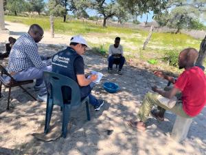 WHO experts engaging with the community on the ground