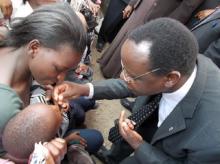 06 Dr Rex Mpazanje administers Vitamin A to one of the children at the launch