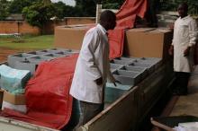 Oral cholera vaccine cold boxes being loaded onto a truck at the routine vaccine stores in Lilongwe ready for transportation to Karonga