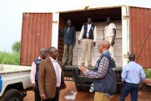 Mr Liyosi and Dr Guyo receiving the vaccines from the Juba Airport warehouse 