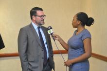 Mr. Andrew Black, Team Leader, Development Assistance at the FCTC Secretariate speaking to a journalist at the launch of the needs assessment report in Lusaka
