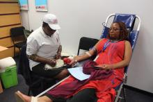 United Nations staff member donating blood