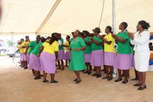 Norton community health workers performing a song