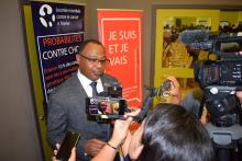 Dr Laurent Musango, WHO Representative in Mauritius, talking to the media