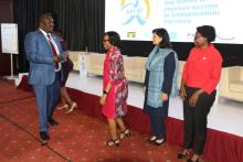 Dr Annet Kisakye receives her award