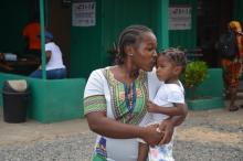 A mother and her son at a vaccination centre