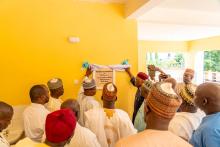Dr Walter Mulombo and Government official during the handover of the facility