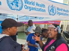 WHO staff educating public about the work done by WHO Botswana