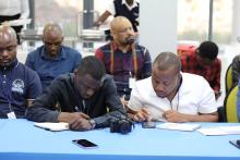 Journalists taking notes  at the event