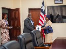 WHO Representative Dr Olushayo Olu with Liberia's Minister of Foreign Affairs H.E. Sara Beysolow Nyanti