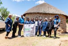 Village health workers pose with WHO and Ministry of Health Officials in Qacha's Nek District
