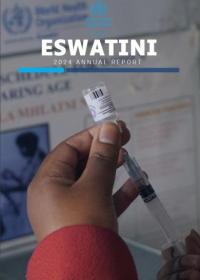 A nurse carefully preparing a syringe for an injection.